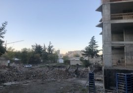 The demolition of existing buildings on the new land has began